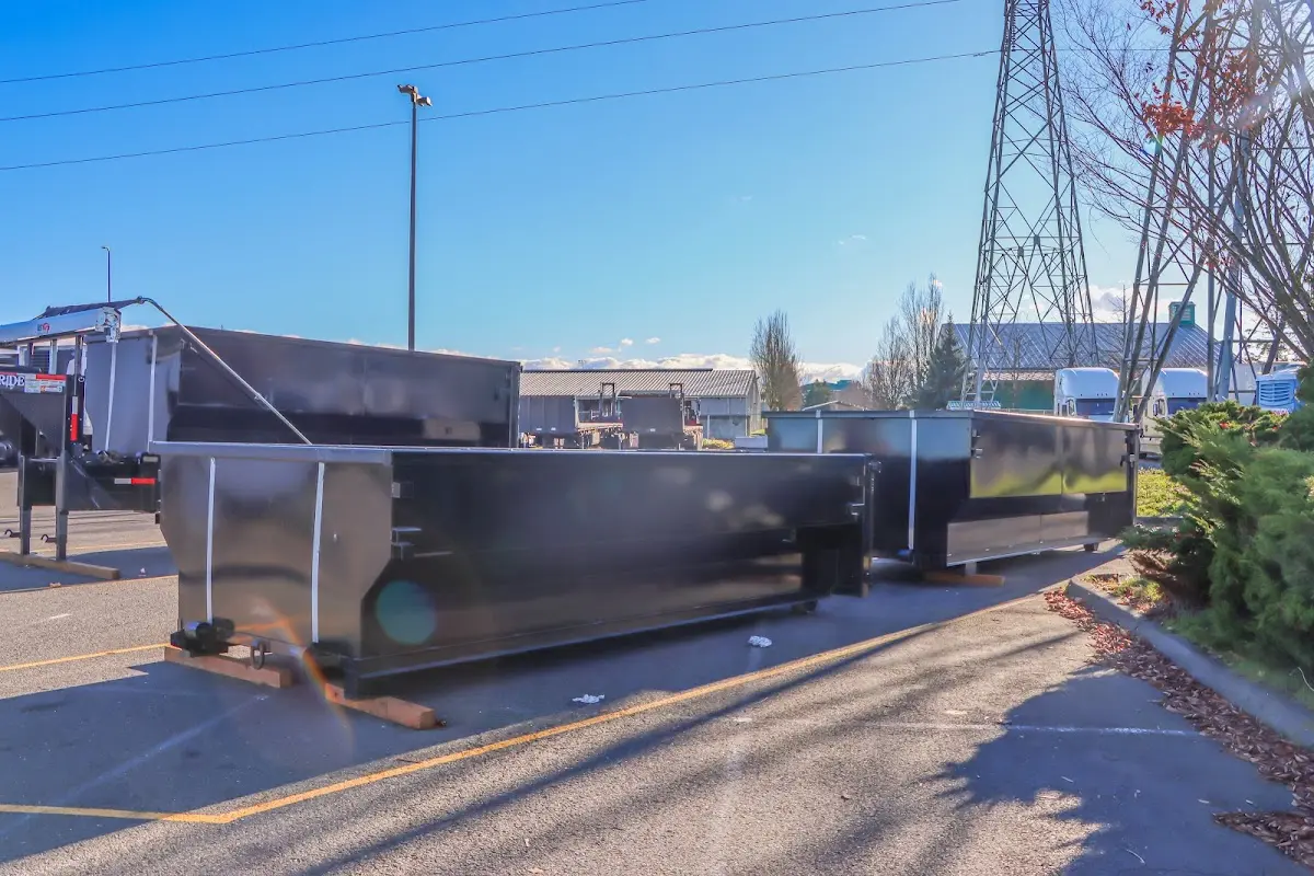 Roll-off dumpster ready for waste disposal at job site for 2 Yard Dumpster Rental in Sunnyside